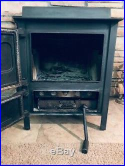 Glacier Bay Used Cast Iron Wood / Coal Stove in excellent condition. It's heavy