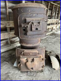 Holland Furnace 220A Brown Cast Iron Woodstove with Humidifier Heating Stove