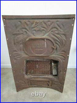 Huge ornate cast iron octopus stove boiler heater door front antique vintage