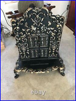 Lady Frank Antique cast iron parlor stove. By the Akron stove co. Patented 1851