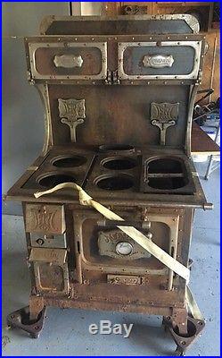 Monarch Cast Iron Wood Burning Antique Stove Complete