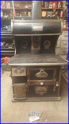 Moore Brothers Antique cast iron stove