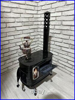 Portable wood burning tent stove, mini cast iron stove, caravan stove Portable wood burning tent stove, mini cast iron stove, caravan stove