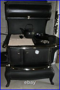 Queen Atlantic roll top wood cook stove