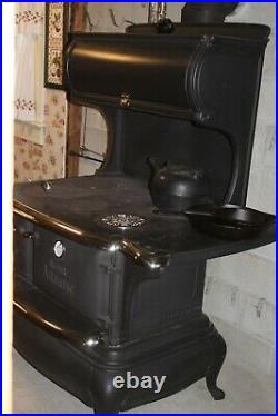 Queen Atlantic roll top wood cook stove