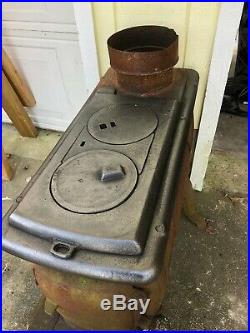 R- Household Cast Iron Wood Burning Stove Is Black Holds 22 Logs 7 Pipe Hole