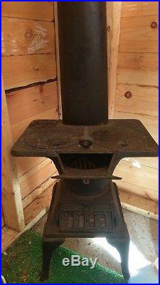 Rare antique vintage cast iron coal wood stove for cabin, shed or decoration