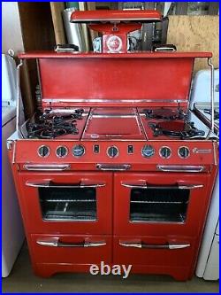 Red 1949 O'Keefe and Merritt 40 with top cover/vanishing shelf
