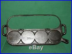 Similar to Wagner No. 4 (#8) Cast Iron Stove Top Pancake 4 Section Flip Griddle