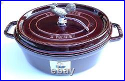 Staub Cast Iron 5.75 QT Coq Au Vin Cocotte French Oven withRooster Knob. Grenadine