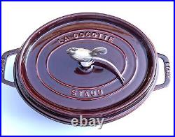 Staub Cast Iron 5.75 QT Coq Au Vin Cocotte French Oven withRooster Knob. Grenadine