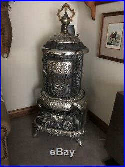 Sterling Oak Cast Iron Wood Burning Parlor Stove. Beautifully Restored
