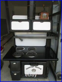 Vintage Country Charm Electric Cast Iron Stove Range, from House of Webster