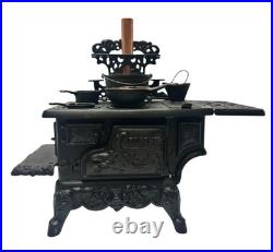 Vintage Crescent Cast Iron Toy Stove Miniature with Accessories Copper Chimney