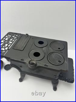 Vintage Crescent Cast Iron Toy Stove Miniature with Accessories Copper Chimney