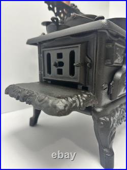 Vintage Crescent Cast Iron Toy Stove Miniature with Accessories Copper Chimney