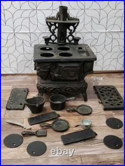 Vintage Crescent Co. Miniature Cast Iron Toy Stove Display With Accessories