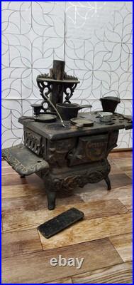 Vintage Crescent Co. Miniature Cast Iron Toy Stove Display With Accessories
