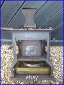 Vintage French made'Flamme Bleue' no. 2 Stove. Cast Iron Stove with Brass base