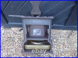 Vintage French made'Flamme Bleue' no. 2 Stove. Cast Iron Stove with Brass base