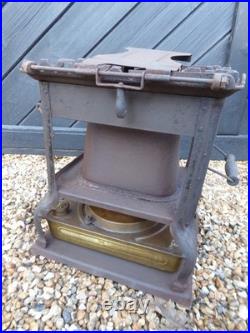 Vintage French made'Flamme Bleue' no. 2 Stove. Cast Iron Stove with Brass base