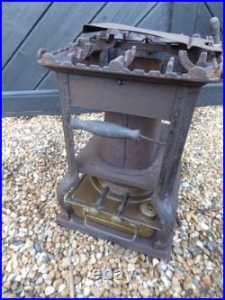 Vintage French made'Flamme Bleue' no. 2 Stove. Cast Iron Stove with Brass base