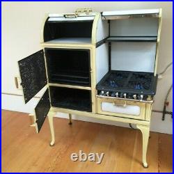 Vintage Glenwood Gas Stove Our way, restored and modernized, yellow and white