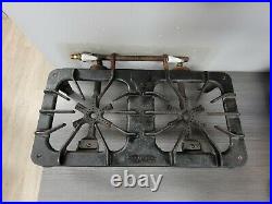 Vintage Griswold Victorian 202 cast iron dual burner stove top orig. Metal tag
