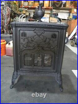 Vintage cast iron wood burning stove completely refurbished