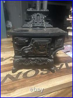 Vintage crescent cast iron stove