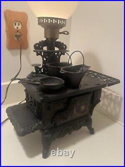 Vintage crescent stove cast iron sample with accessories