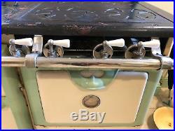 Wonderful working Wehrle Green and cream enamel cast-iron gas and wood stove