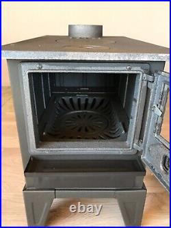 Wood and coal burning cast iron stove, camping, caravan and tent stove