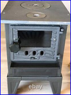 Wood and coal burning cast iron stove, camping, caravan and tent stove